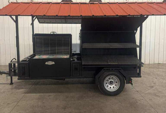 SNS Ultimate Mega Grill commercial charcoal BBQ catering trailer with two-sided grill chambers, rotating racks, pull-out charcoal trays, ash pans, and red roof canopy