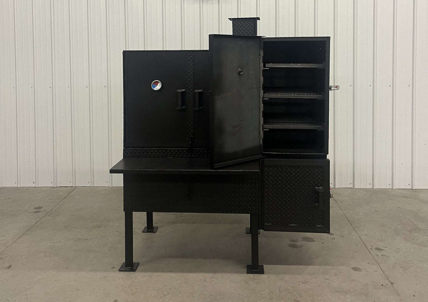 Heavy-duty SNS 40 smoker cabinet with large 30x40 main chamber, three racks, and insulated firebox, designed for patios or concession trailers.