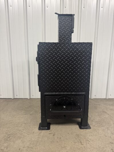 Black metal grill against a white wall