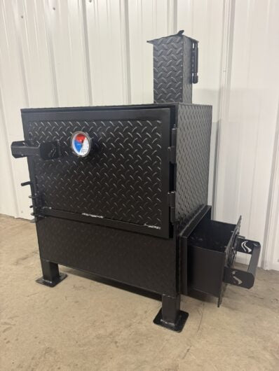 Black metal barbecue smoker with a visible brand logo against a white wall.