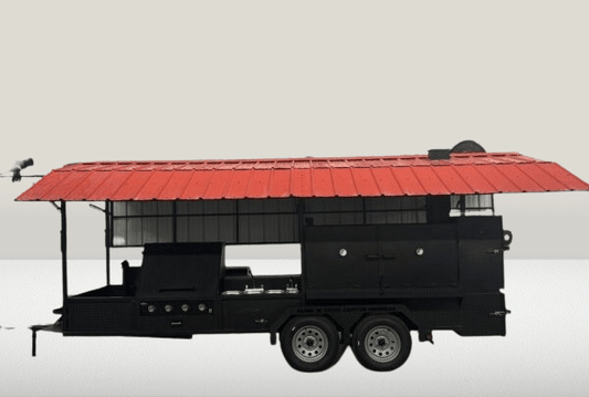 Custom Ultimate Smokehouse 72-inch smoker on trailer with red roof, charcoal grill, propane griddle, and sink package