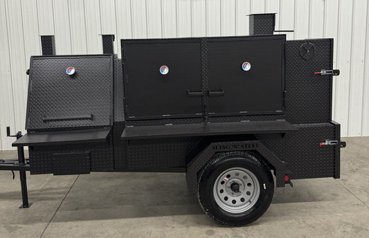 Black SNS 60 Cabinet smoker and charcoal grill trailer with multiple doors and temperature gauges on single tire trailer