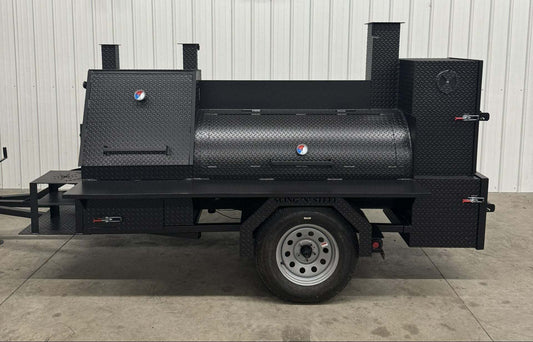 Black SNS Barrel 60 offset smoker catering trailer with diamond tread steel, multiple cooking racks, charcoal grill, rib box, fish fryer, and three-bay sink package.