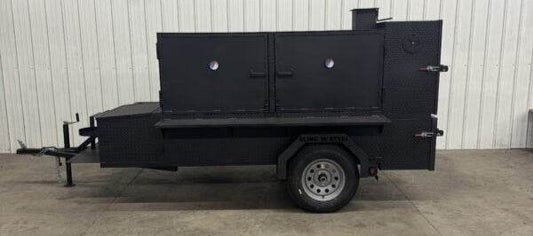 Large SNS Beast Cabinet wood smoker on trailer with full length storage and dual cooking chambers