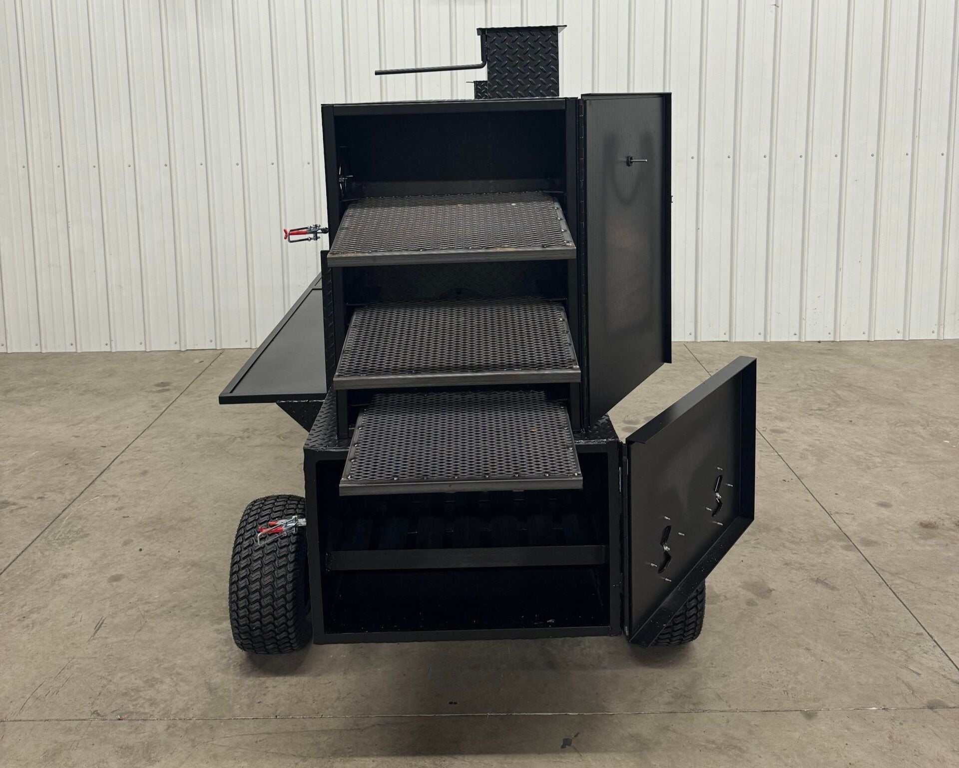 SNS Competition Wagon Backyard BBQ smoker with multiple cooking racks and charcoal grill on wagon chassis with pull handle