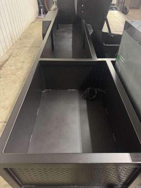 Interior storage compartments of SNS Hospitality BBQ Trailer designed for catering and outdoor events
