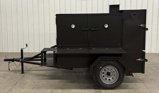 SNS Smoke House black steel smoke cabinet smoker trailer with large cooking chamber and flat grill