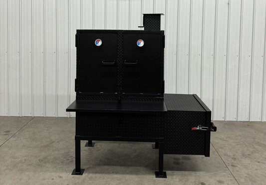 Black SNS 40 smoker cabinet with large 30x40 main chamber and double-walled insulated firebox for heavy-duty outdoor smoking.
