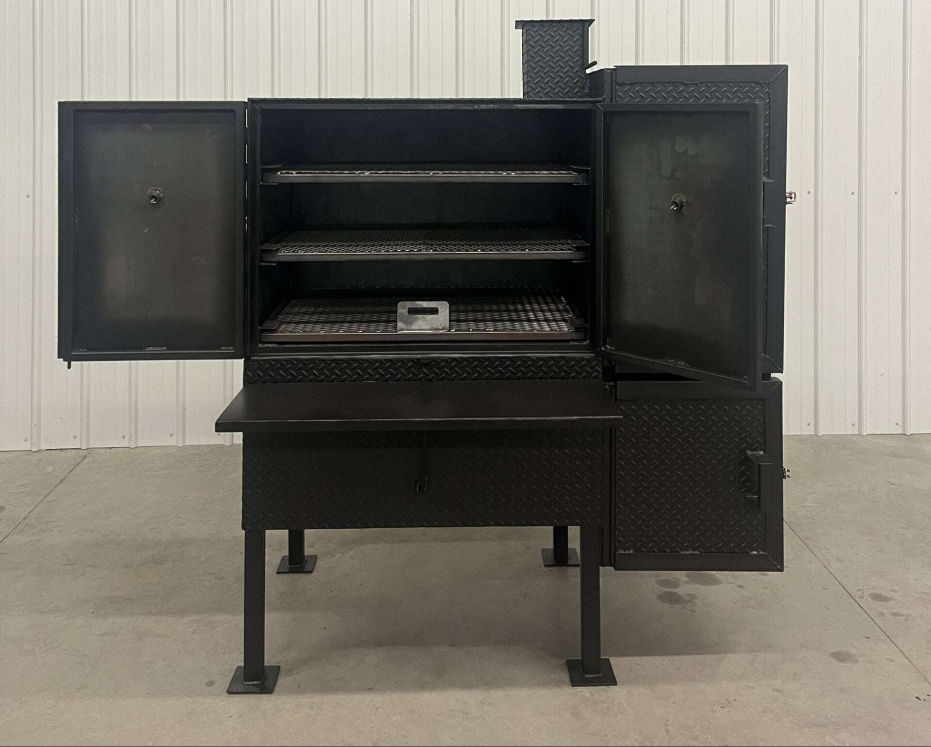 SNS 40 smoker cabinet with large 30x40 inch chamber, three racks, double-walled insulated firebox, heavy-duty construction for patio or concession use